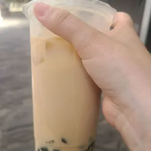 Milk tea sweetened moderately, no added flavor, with boba