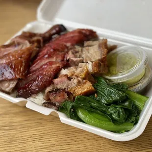 Triple combo (roasted duck, BBQ pork, roasted pork over white rice)