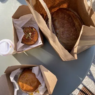 Pastry, breakfast sandwich, and fresh sourdough loaf