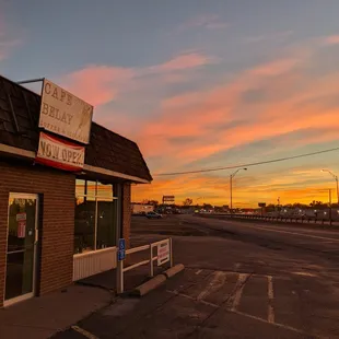 a sunset in the background