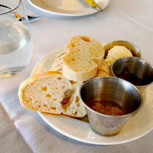 a plate of bread and dipping sauce
