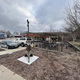 a parking lot with cars parked in the background