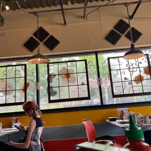 a woman sitting at a table