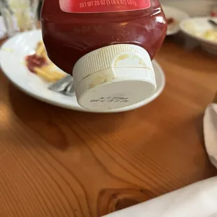 Dirty ketchup bottle.