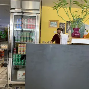a woman behind the counter