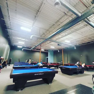 Billiards and pool tables, including official tournament size