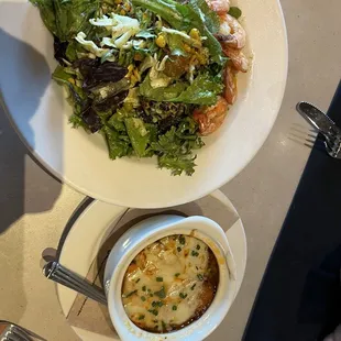 a plate of food and a bowl of soup