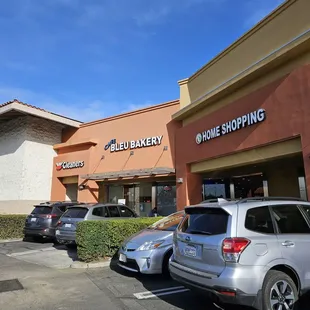 cars parked in front of the store
