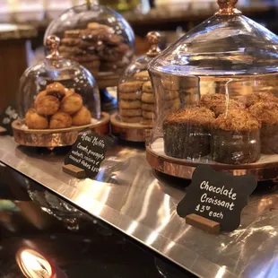 a display of cookies and pastries