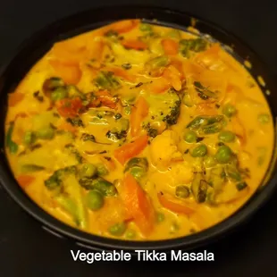 a bowl of vegetable tikka masala