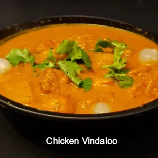 a bowl of chicken vindalo