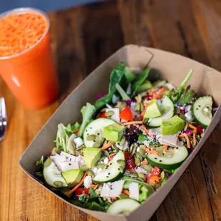 Thai Crunch Salad, Housemade Peanut Dressing &amp; Immune to It fresh juice.