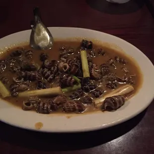 Snails with coconut sauce
