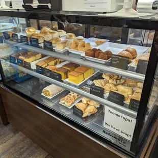 a display case full of pastries