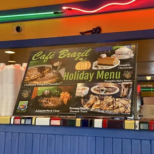 a menu and a neon sign