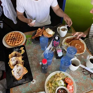 a man and a woman eating breakfast