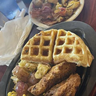 Chicken and waffles, potatoes, eggs