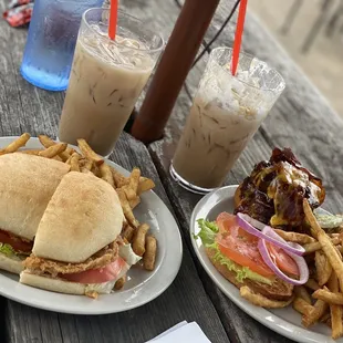 a sandwich and french fries on a picnic table