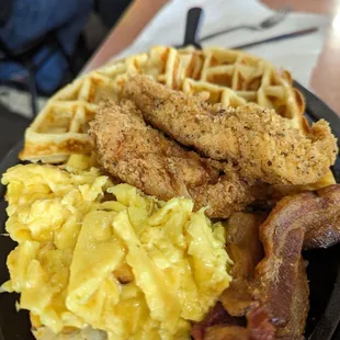 Yumalicious eggs, chicken,bacon and waffles.enough to take home for tomorrow