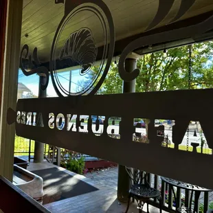 A view of the street from our table, including the sign.