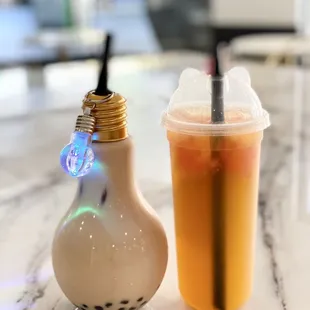 a cup of bubble tea and a salt shaker