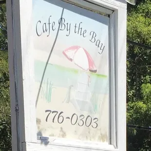 a sign for a cafe