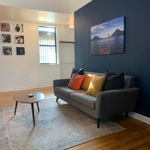 a living room with a couch and a coffee table