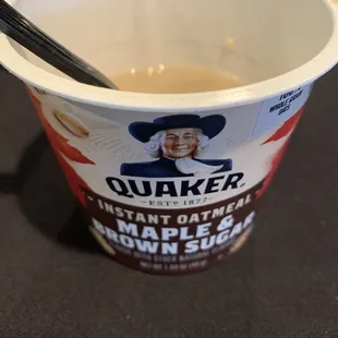 a cup of coffee with a spoon in it