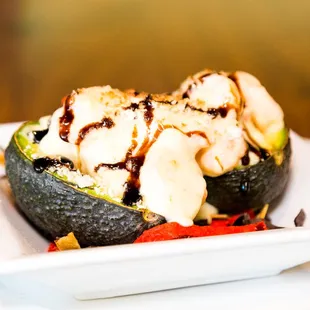 an avocado with ice cream and bananas