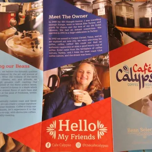 a brochure of a woman holding a cup of coffee