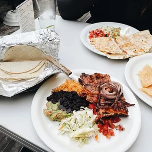 Pork adobo plate and chicken adobo quesadilla