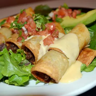 Super fresh Cali Mex .. Our Flautas Con Crema are stuffed with tender, juicy meats and flash fried until golden.