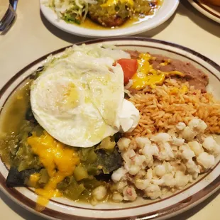a plate of mexican food on a table