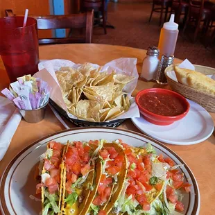 The taco flight with half beef and half chicken, there&apos;s a huge sopapilla in the basket I can&apos;t wait!!!
