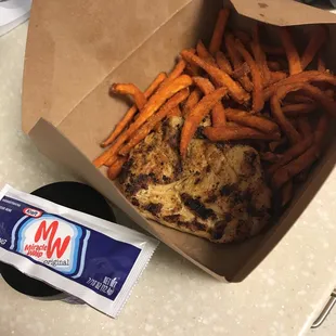 a box of fries and sweet potato chips