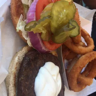Hamburger and onion rings from the grill