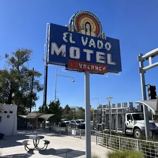 Sign by entrance to patio