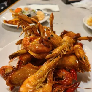 a plate of cooked shrimp