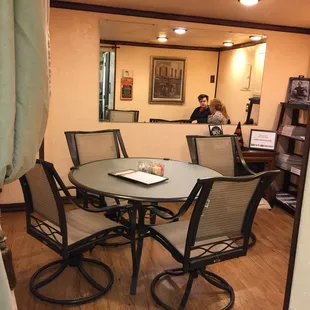 a table and chairs in a restaurant