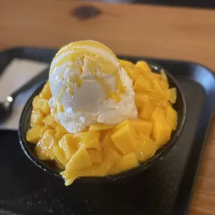 a bowl of mango ice cream