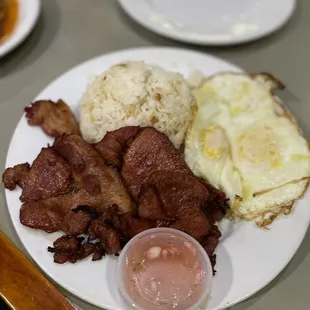 Tosilog , garlic rice and eggs