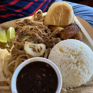 Vaca Frita with white Rice And Beans. With a side of Plantains