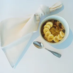 a bowl of cereal and a spoon