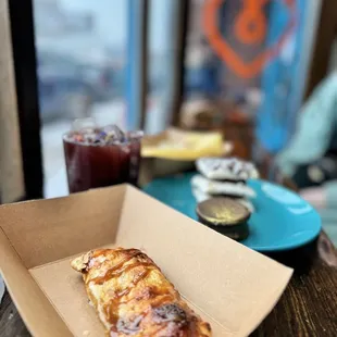  piece of pizza in a box on a table