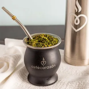  cup of coffee with a spoon in it