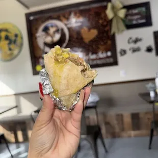 Breakfast burrito  This hit the spot  Ask to add the green salsa  Unique flavor with delicious frijoles de la olla