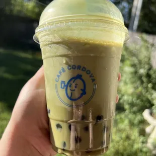 Matcha green tea with boba pearls