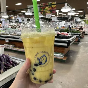 Mango fruit tea with tapioca boba