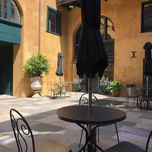 Outdoor seating in the courtyard at The Historic New Orleans Collection
