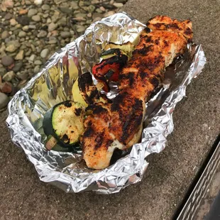 grilled chicken and vegetables in foil